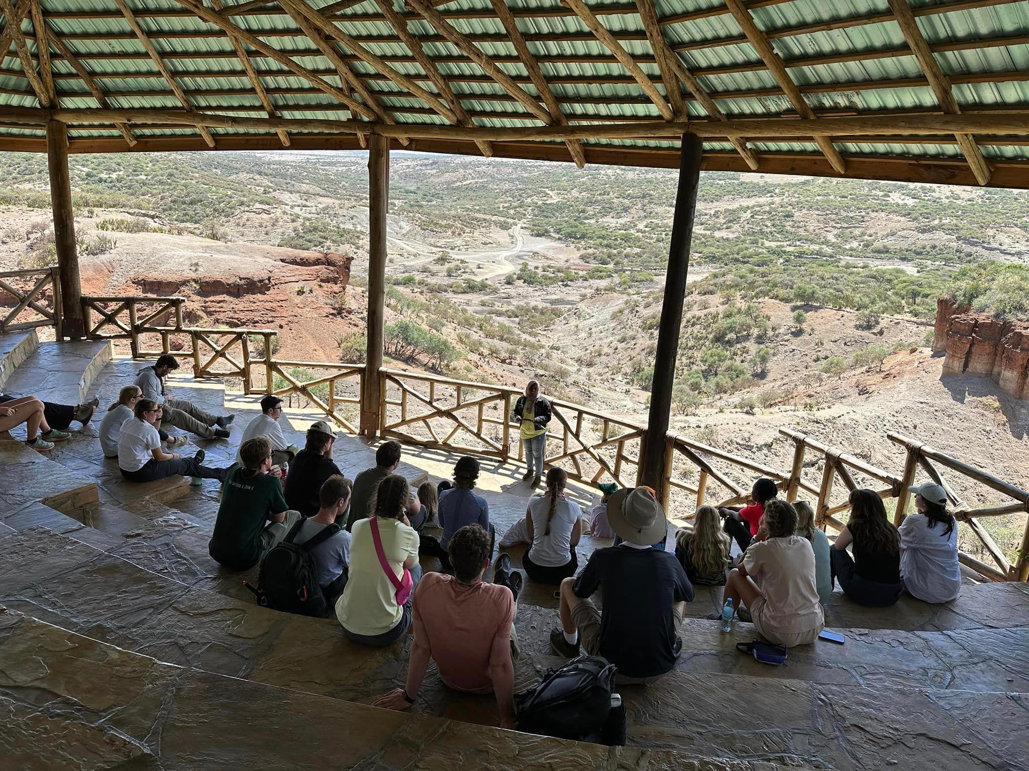 Students studying in an outdoor classroom in Tanzania